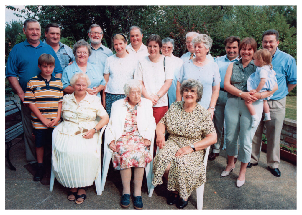 Photograph of members of the Pattern family, likely taken in 2000.